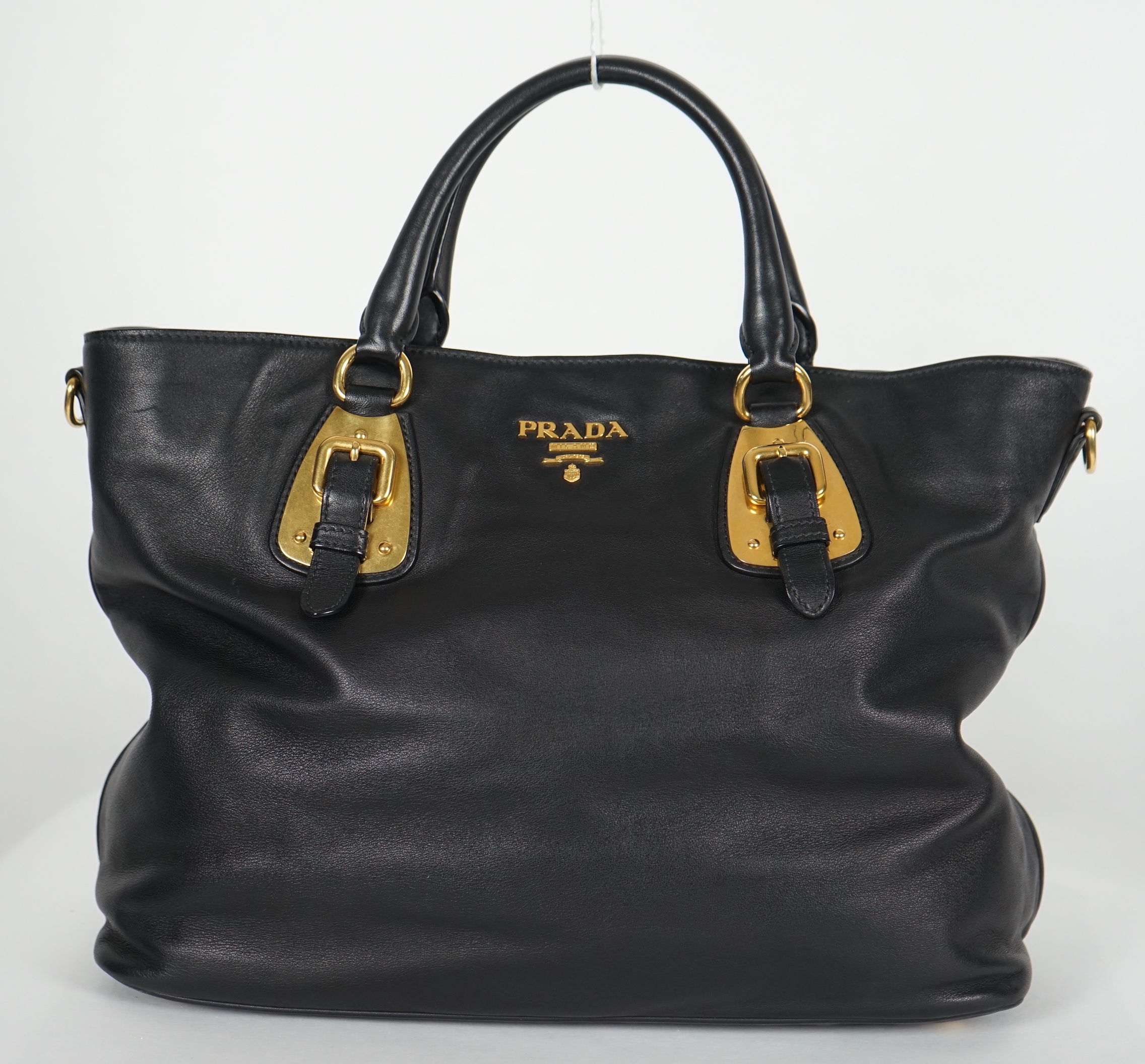 A Prada Vitello black leather bag with detachable strap, width 40cm, max heigh 27cm, depth 17cm